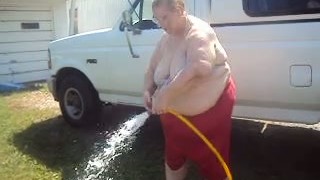 BBW Granny With Saggy Boobs Is Playing With Hose Outdoor