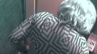 Mature White Lady With Blue Dyed Hair Filmed In The Toilet Room