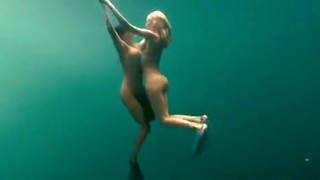 Busty Naked Swimmers Make Erotic Underwater Art
