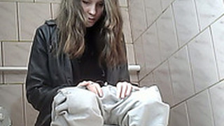 Beautiful Tall Brunette Chick In White Jeans Pisses In The Toilet