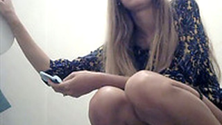 Long Haired Hot Blonde Girl Pisses In The Toilet Room