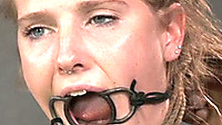 Blonde Slave With A Ring Gag In Her Mouth Is Bounded And Punished