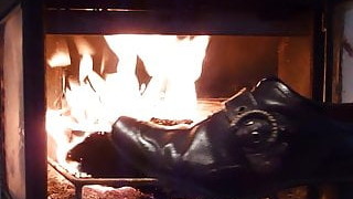 Burning Wifes Brown Buckle Shoe In The Fireplace